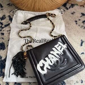 *SOLD*
Vintage Chanel Small Black Lambs Leather CC Logo Timeless bag - RARE